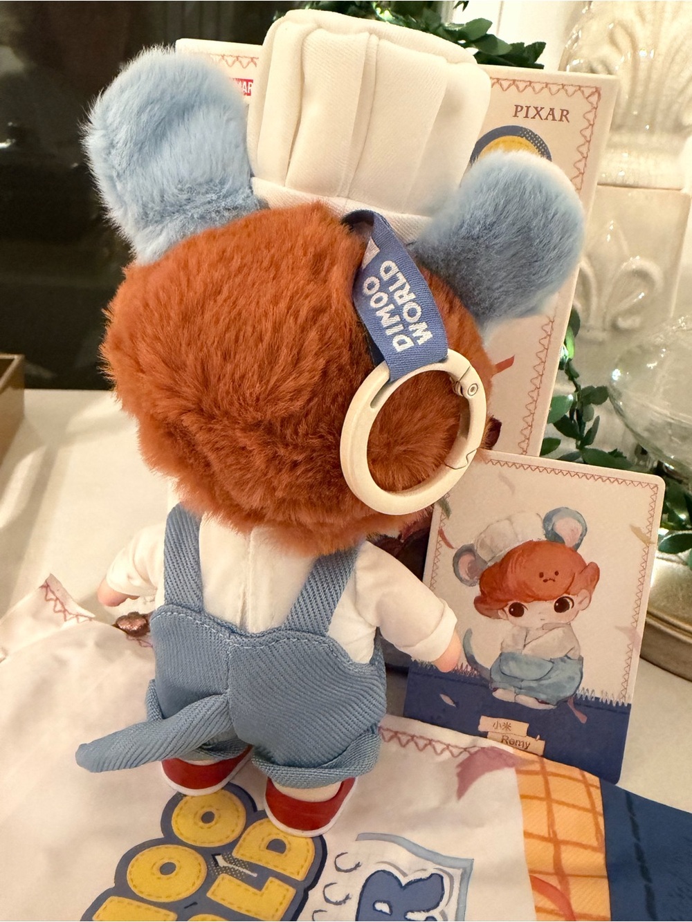 Pop Mart Dimoo World Pixar Remy Plush Pendant - Picture 2 of 7